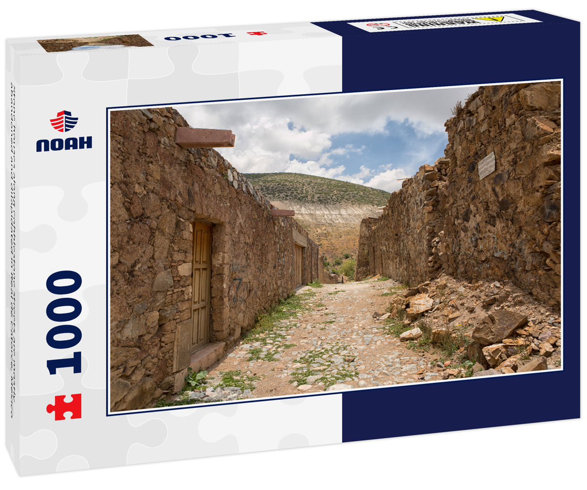 Stone houses along cobblestone streets are mostly abandoned and dilapidated in Real de Catorce, Mexico