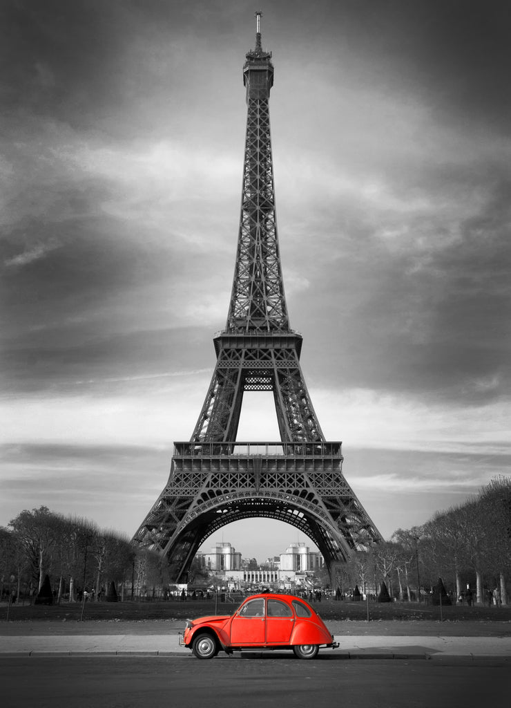 Red car in front of Eiffel Tower Paris