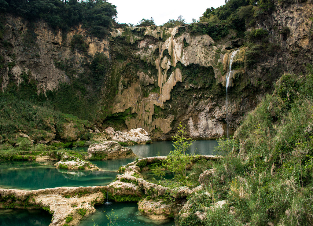 Panoramic view of El Salto waterfall with little falling water and the turquoise water pools, in Mexico in the Huasteca Potosina in San Luis Potosí