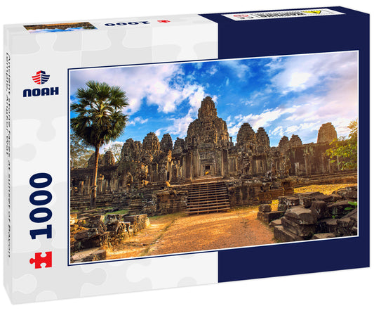 Ancient stone faces at sunset of Bayon temple, Angkor Wat