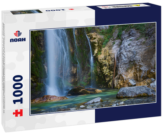 Grunas waterfall 2 km behind the village of Theth in Albania. Theth is a small village in Shkodër county in Albania. It is a protected landscape area