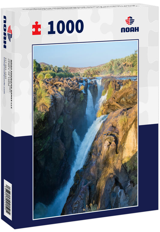 View over beautiful scenic Epupa Falls on Kunene River between Angola and Namibia in evening light