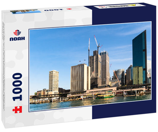 Sunny day over Sydney business district skyline and the Circular Quay ferry terminal in Sydney, Australia largest city