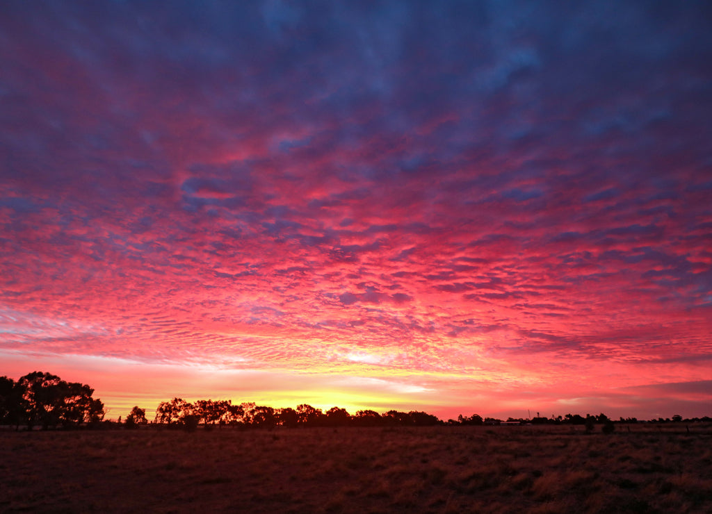 Vibrant pink and purple sunset sky in Central Victoria, Australia
