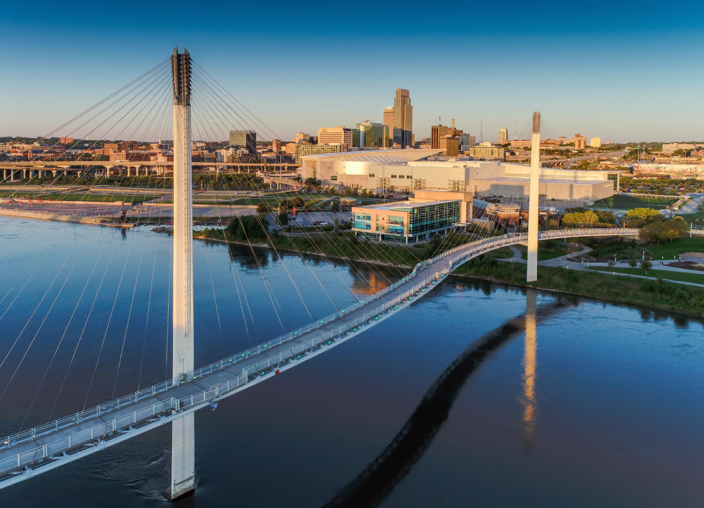 Bob Kerry Pedestrian Bridge spans the Missouri river with the Omaha Nebraska skyline