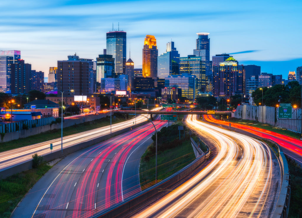 Minneapolis skyline with traffic light at night