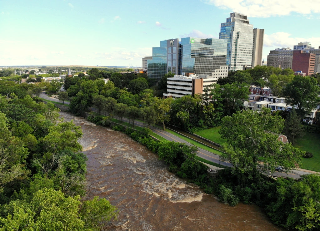 The aerial view of the flooded river and downtown buildings near Wilmington, Delaware, U.S.A