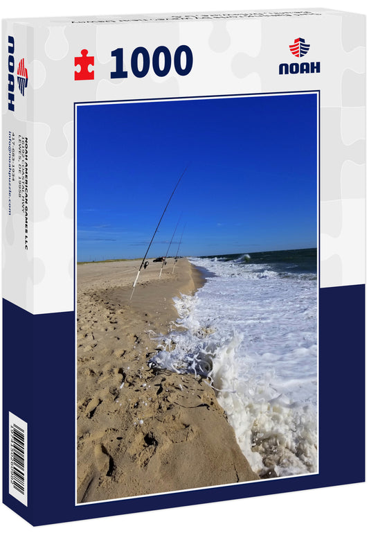 Surf fishing rods by waves near Dewey Beach, Delaware, U.S