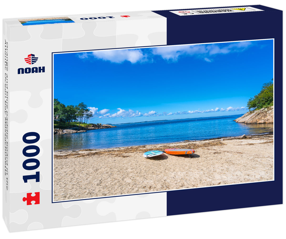 Orange and blue paddle board in the Atlantic Ocean bay Massachusetts