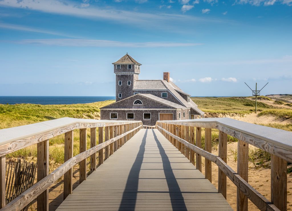 Blue sky and dunes, ife saving station building in Provincetown Massachusetts