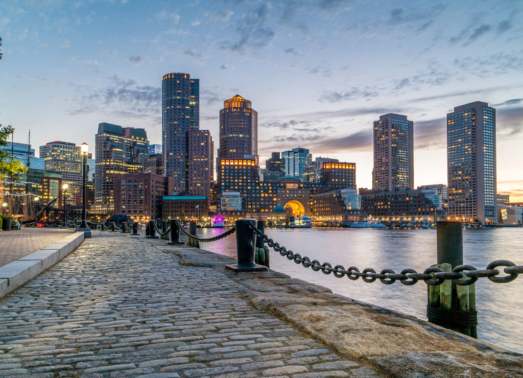 Boston Harbor and Financial District view from harbor on downtown, cityscape at sunset, Massachusetts, USA