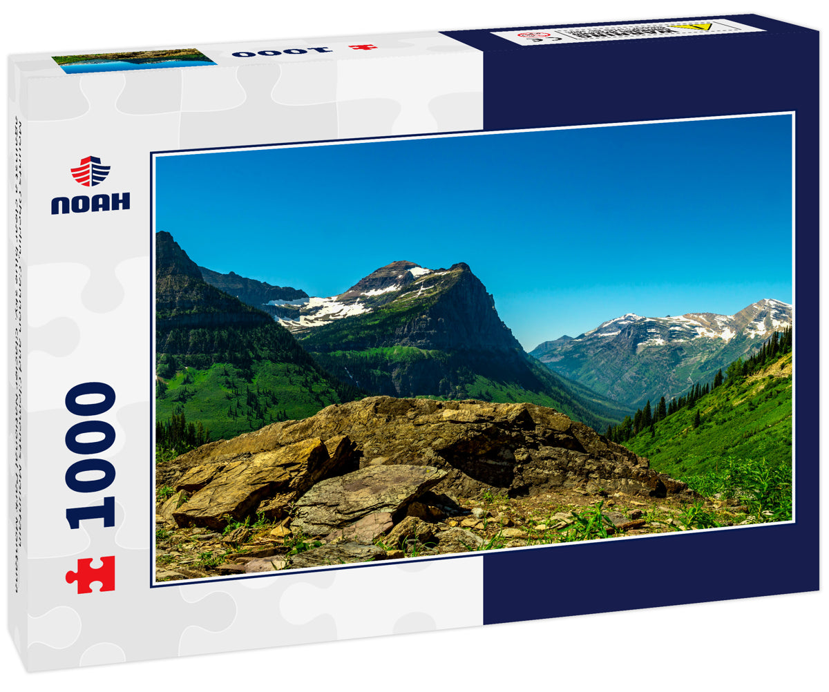 Mounts Oberlin, Cannon and Clements Mountain against a clear blue sky. Glacier National Park Montana