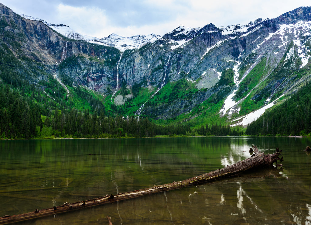 Waterfalls on the rim of Avalanche lake, Glacier National Park Montana