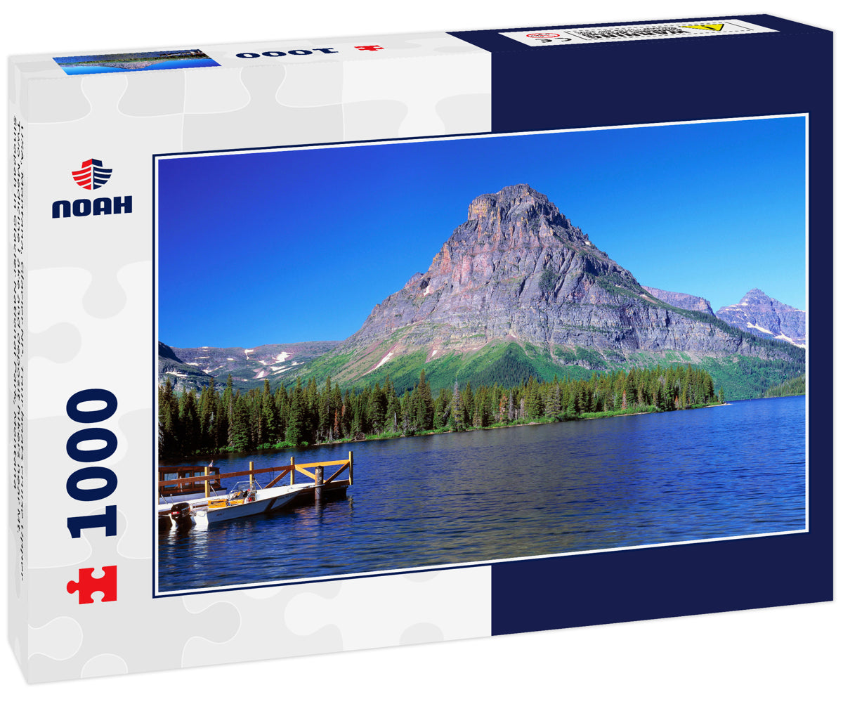 USA, Montana, Glacier NP. Tour boats cruise Upper Two Medicine Lake and deposit hikers near Mt. Sinopah in Glacier National Park, Montana