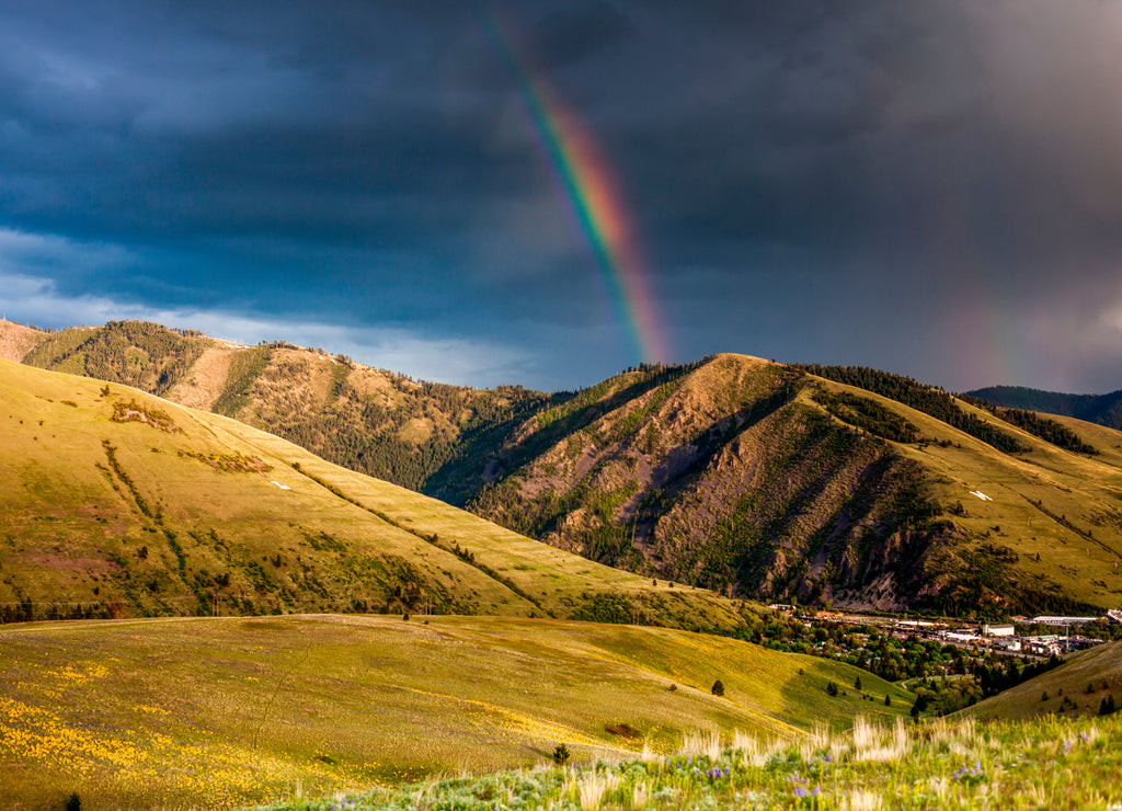 Rainbow at sunset over Hellgate Canyon in Missoula, Montana