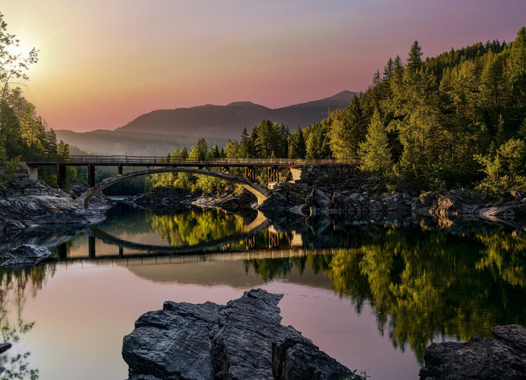 Sunrise across Belton Bridge over Middle Fork Flathead River near West Glacier in Glacier National Park, Montana