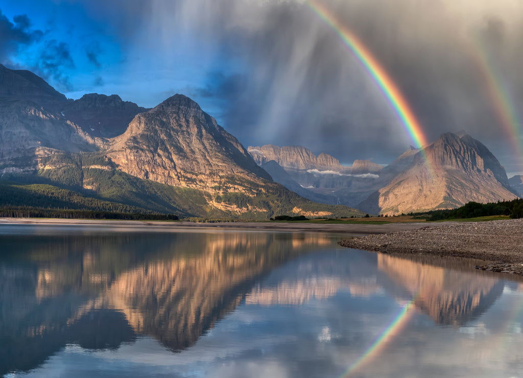 Beautiful Panoramic View of American Rocky Mountain Landscape. Dramatic Sunrise Sky with Rainbow. Art Render. Taken in Glacier National Park, Montana, United States