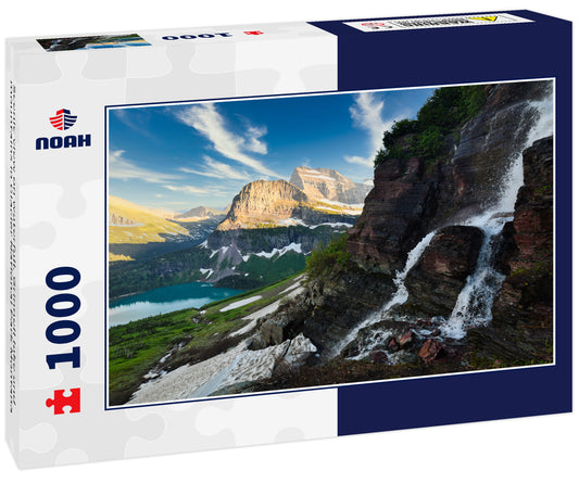 Scenic view on waterfall, Grinnell lake and mountains in Glacier National Park Montana