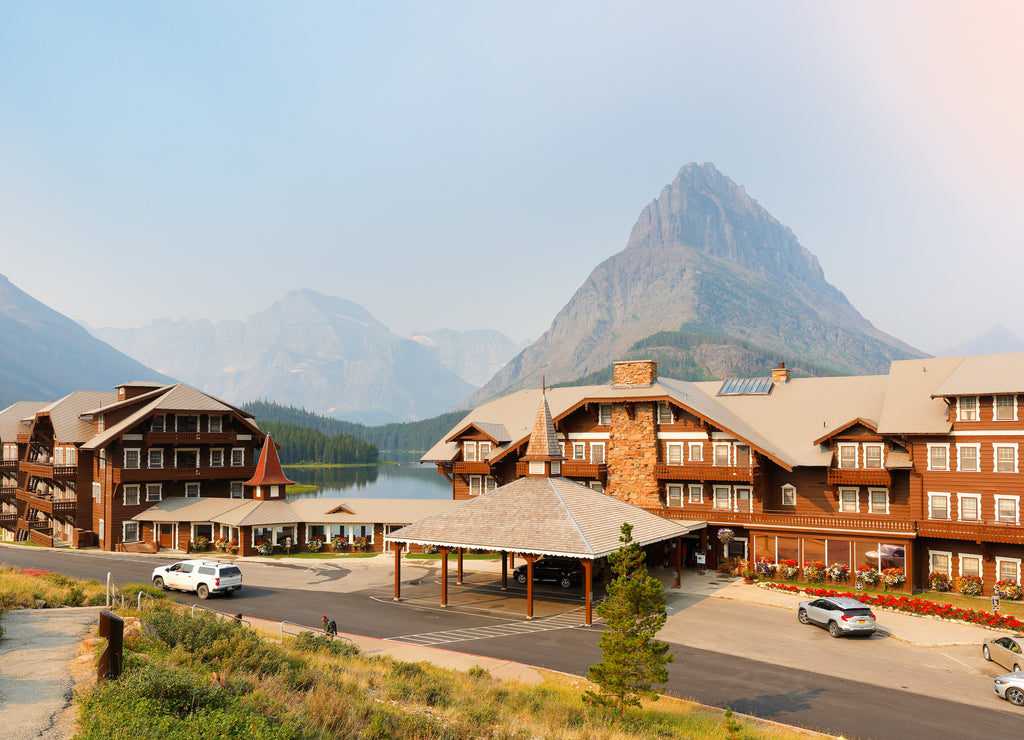 Many Glacier historic hotel at at sunrise. Swiftcurrent Lake, Glacier National Park Montana