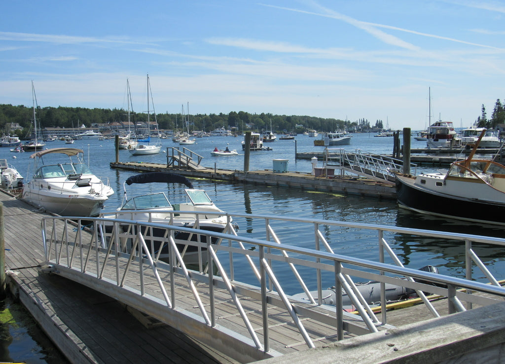 View over the water at Boothbay Harbor in Maine with boats and buoys