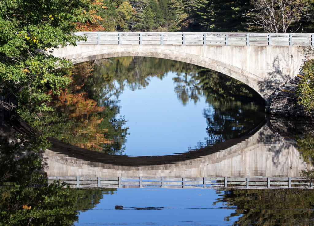 Reflection of a stone bridge Maine