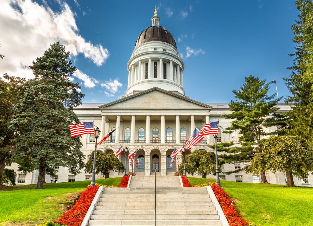 Maine State House, in Augusta, on a sunny day. The building was completed in 1832, one year after Augusta became the capital of Maine