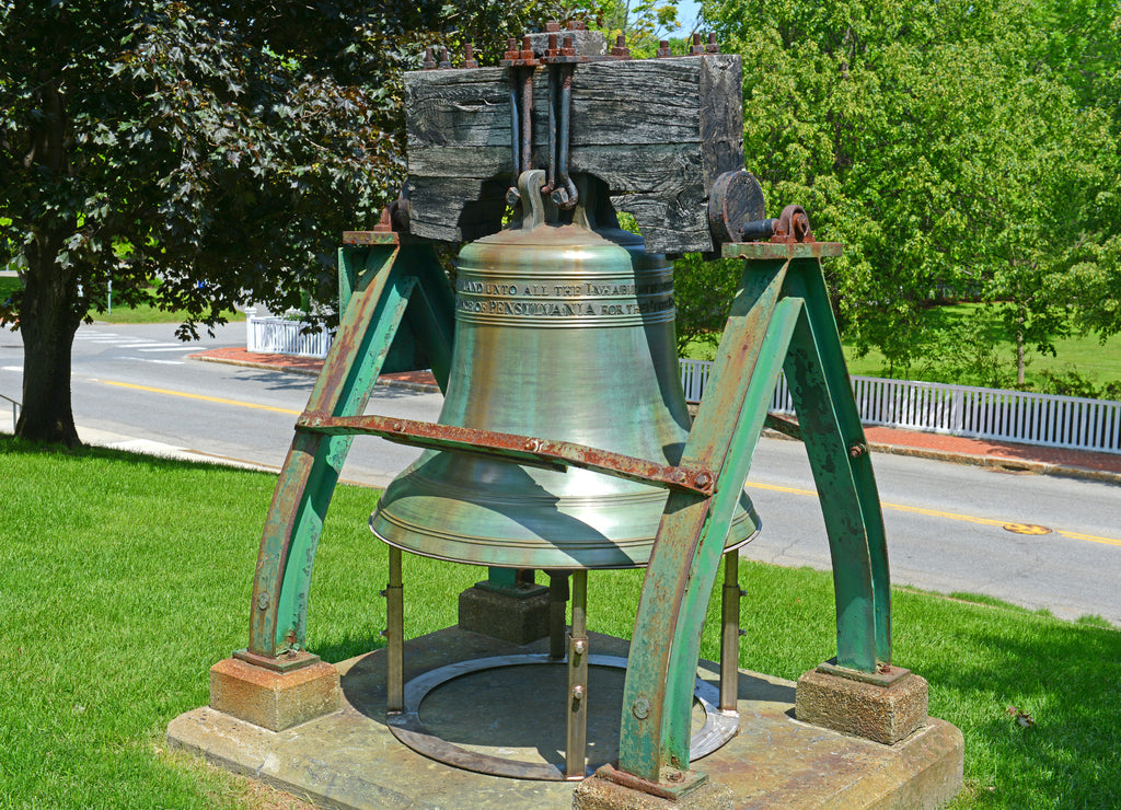 Liberty Bell in front of Maine State House. This building is the state capitol of the State of Maine in Augusta, Maine, USA. Maine State House was built in 1832 with Greek Revival style