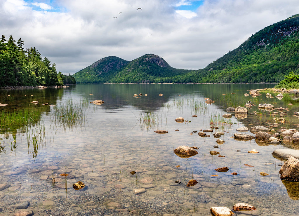 Tranquil water of Jordan Pond in Acadia National Park near the town of Bar Harbor, Maine USA