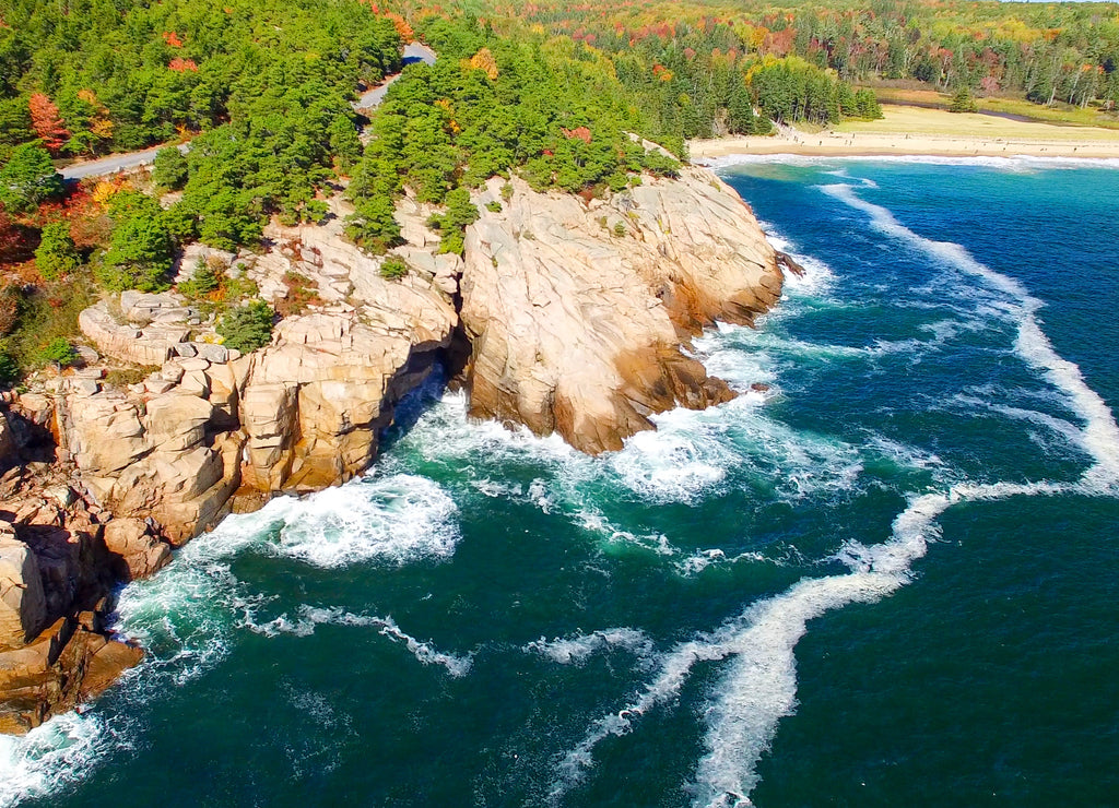 Aerial view of fall foliage and Acadia rocky coast, Maine USA