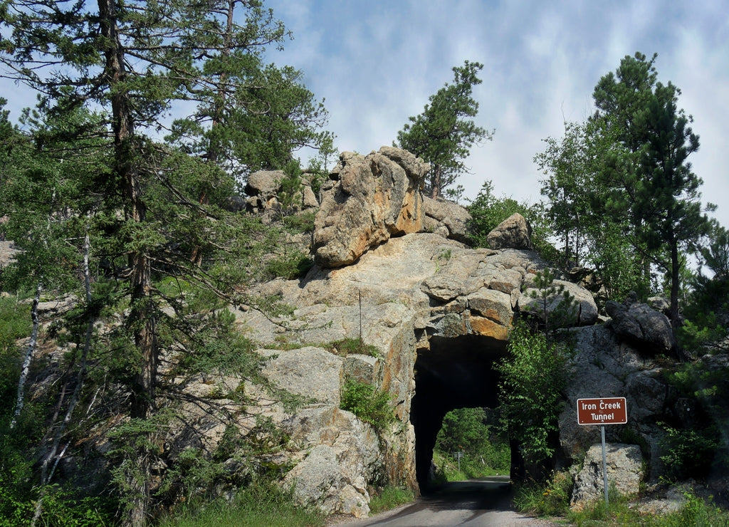 Stunning road view of Iron Creek Tunnel, one of the attractions along Needles Highway at Custer State Park, South Dakota