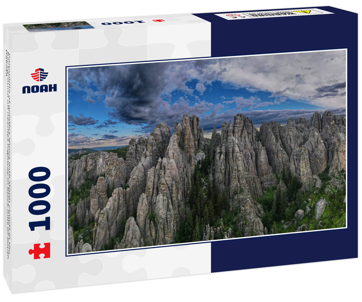 panorama of needles spires with storm clouds in the background off needles highway in black hills of South Dakota