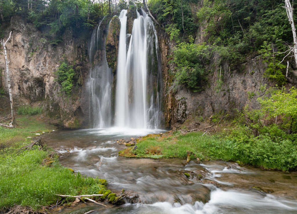 Summer view of Spearfish Falls in the Black Hills National Forest of South Dakota
