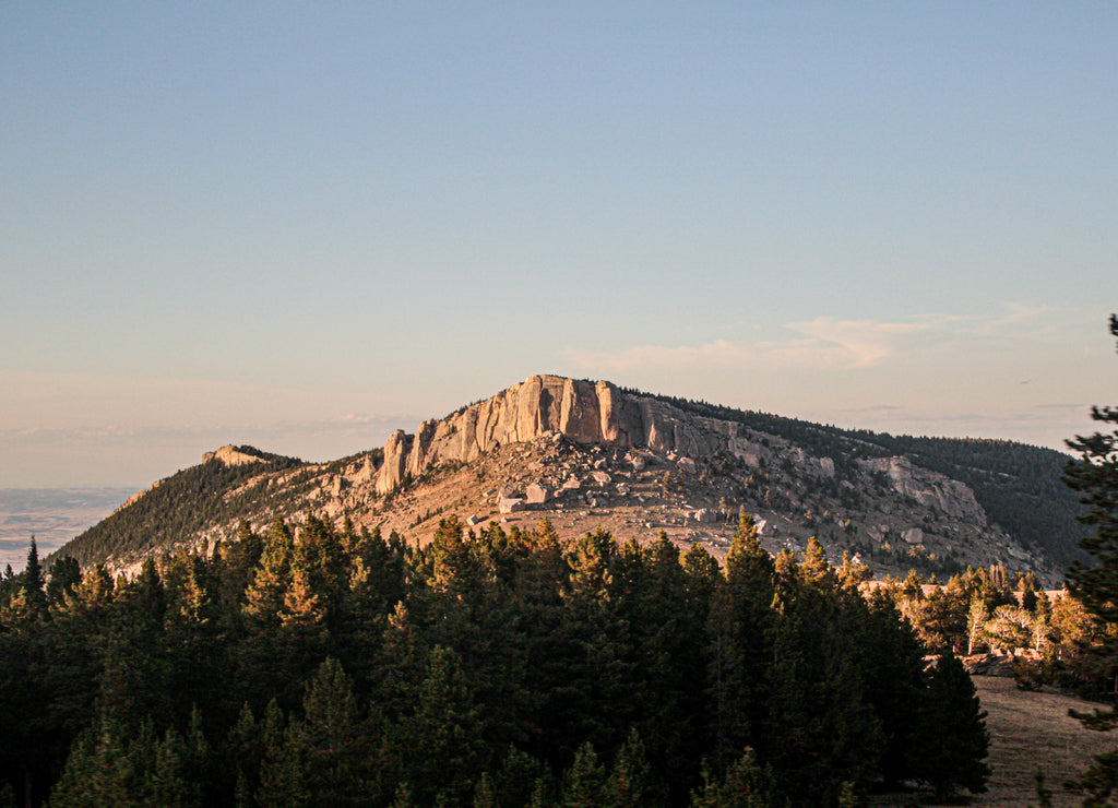 the sunset bouncing on a hill in South Dakota
