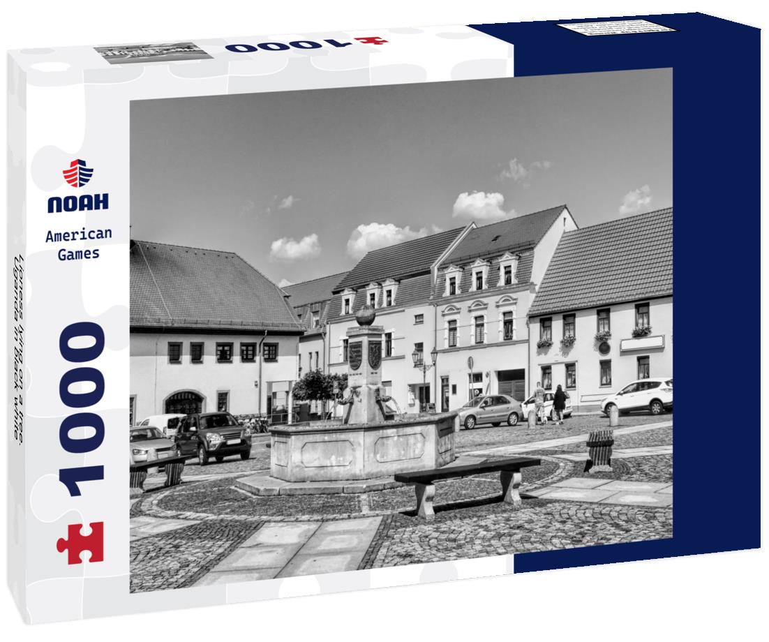 Noah Jigsaw Puzzle Lioness lying on a tree. Uganda in black white 1000 pieces