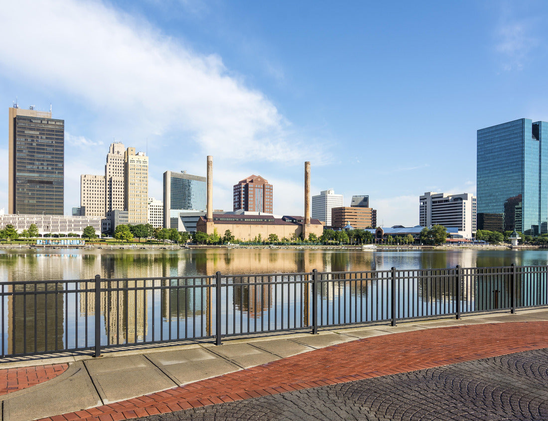 Noah Jigsaw Puzzle A panoramic view of downtown Toledo Ohio's skyline from across the Maumee river at a popular restaurant area with a paver brick boardwalk and a decorative iron railing 1000 pieces