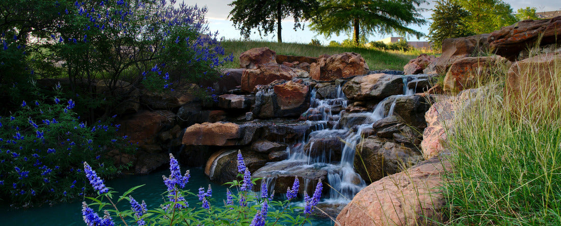 A waterfall in a beautiful Frisco, TX park 2000pc Panoramic Puzzle