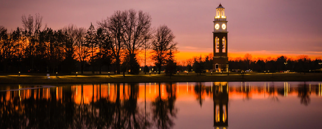 Bell tower and lake at Coxhall Garden in Carmel Indiana at sunset in the winter 2000pc Panoramic Puzzle
