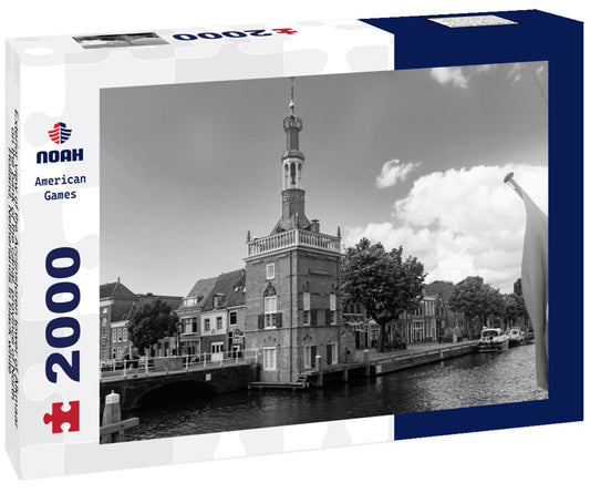 Noah Jigsaw Puzzle Exterior view of the Accijnstoren tower of Alkmaar on the bank of the canal, province of North Holland, Netherlands in black white 2000 pieces