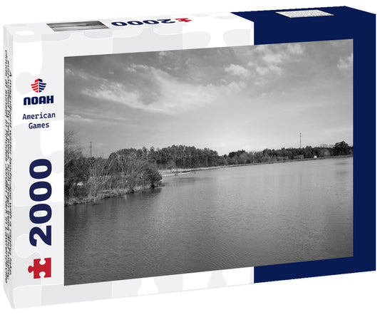 Noah Jigsaw Puzzle A magnificent winter landscape with a raging lake surrounded by red trees, lush green trees and mighty clouds at sunset in Rhodes Jordan Park in Lawrenceville Georgia USA in black white 2000 pieces