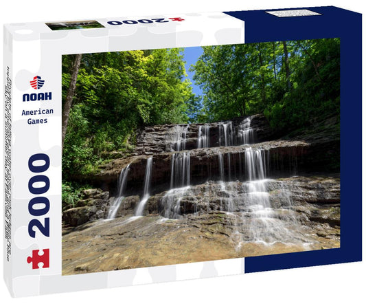 Noah Jigsaw Puzzle Rivulets of falling water over rock ledges are topped by emerald green leaves and a deep blue sky on a summer day at Fallsville Falls, Ohio 2000 pieces