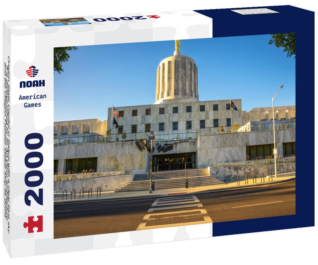 Noah Jigsaw Puzzle Oregon State Capitol in Salem with a clear blue sky. It is distinguished by its Art Deco architecture and the Oregon Pioneer statue atop its dome 2000 pieces