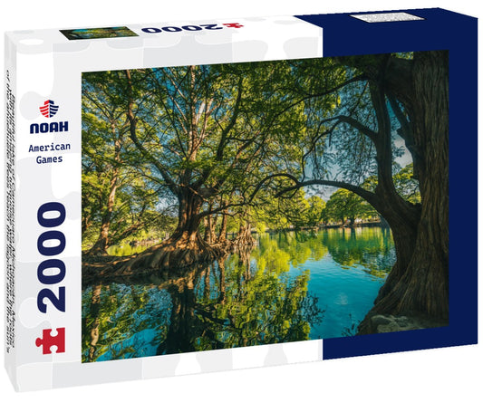 Noah Jigsaw Puzzle Beautiful lake of Camecuaro Michoacán, Mexico, with its amazing turquoise water, where the roots of the ahuehuete trees reach the lagoon and the sun's rays pass through the branches of the trees 2000 pieces