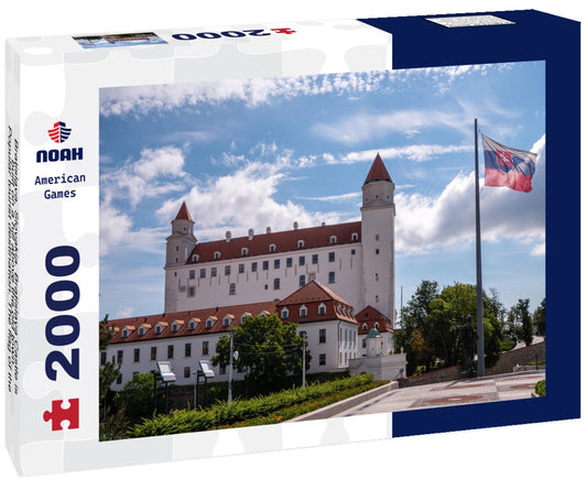 Noah Jigsaw Puzzle Bratislava, Slovakia. Bratislava Castle is built on a hill above the old town. Popular tourist destination. The flag of the Slovak Republic flies in front of the castle 2000 pieces