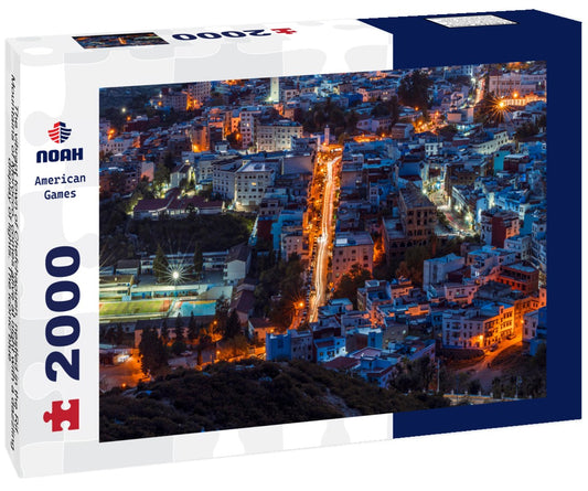 Noah Jigsaw Puzzle The vibrant town of Chefchaouen, nestled in the Rif Mountains of Morocco, comes alive at night with a dazzling display of lights. The iconic blue-washed buildings create a magical and picturesque view 2000 pieces