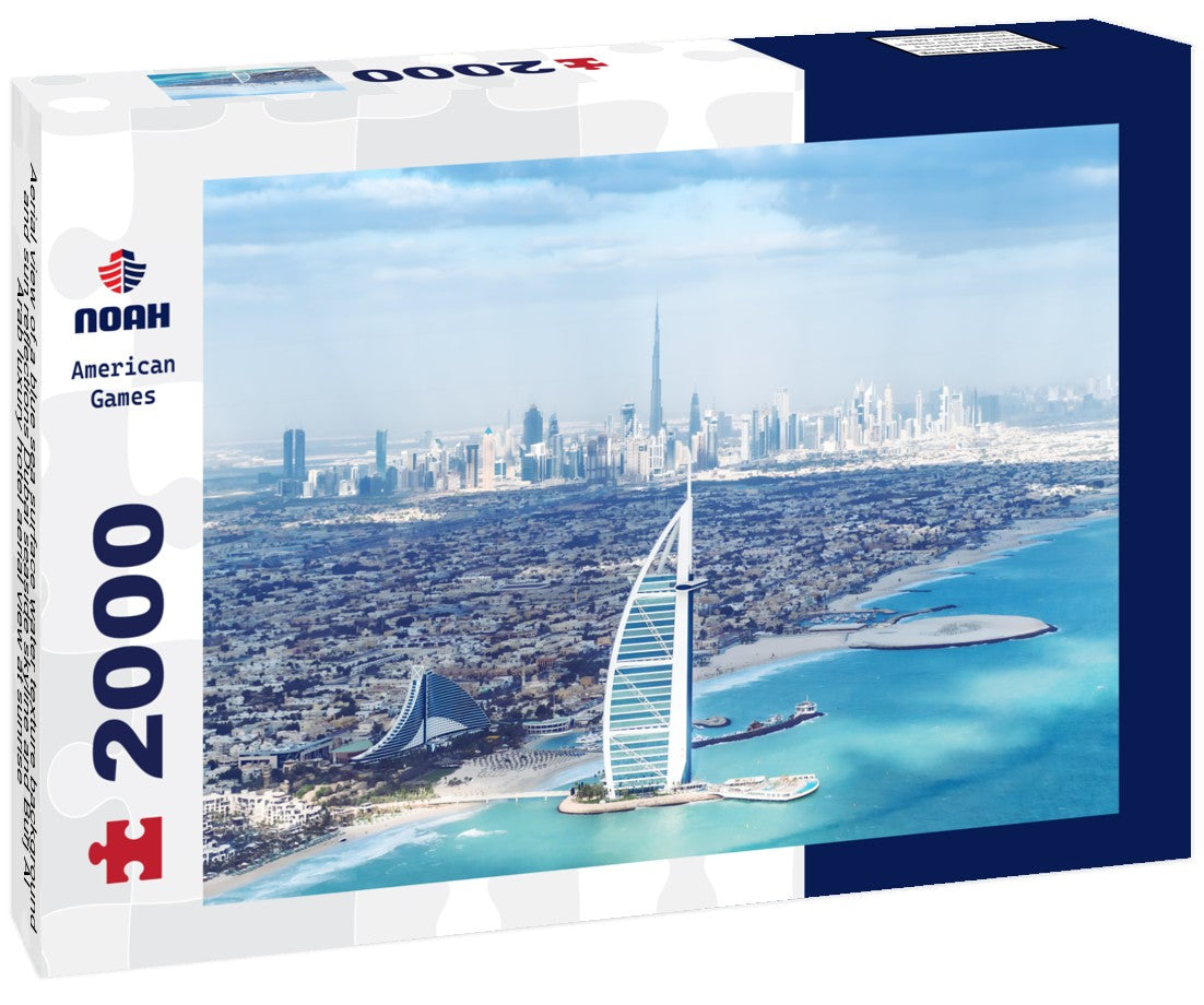 Noah Jigsaw Puzzle Aerial view of a blue sea surface water texture background and sun reflections Dubai seaside skyline and Burj Al Arab luxury hotel aerial view at sunrise 2000 pieces