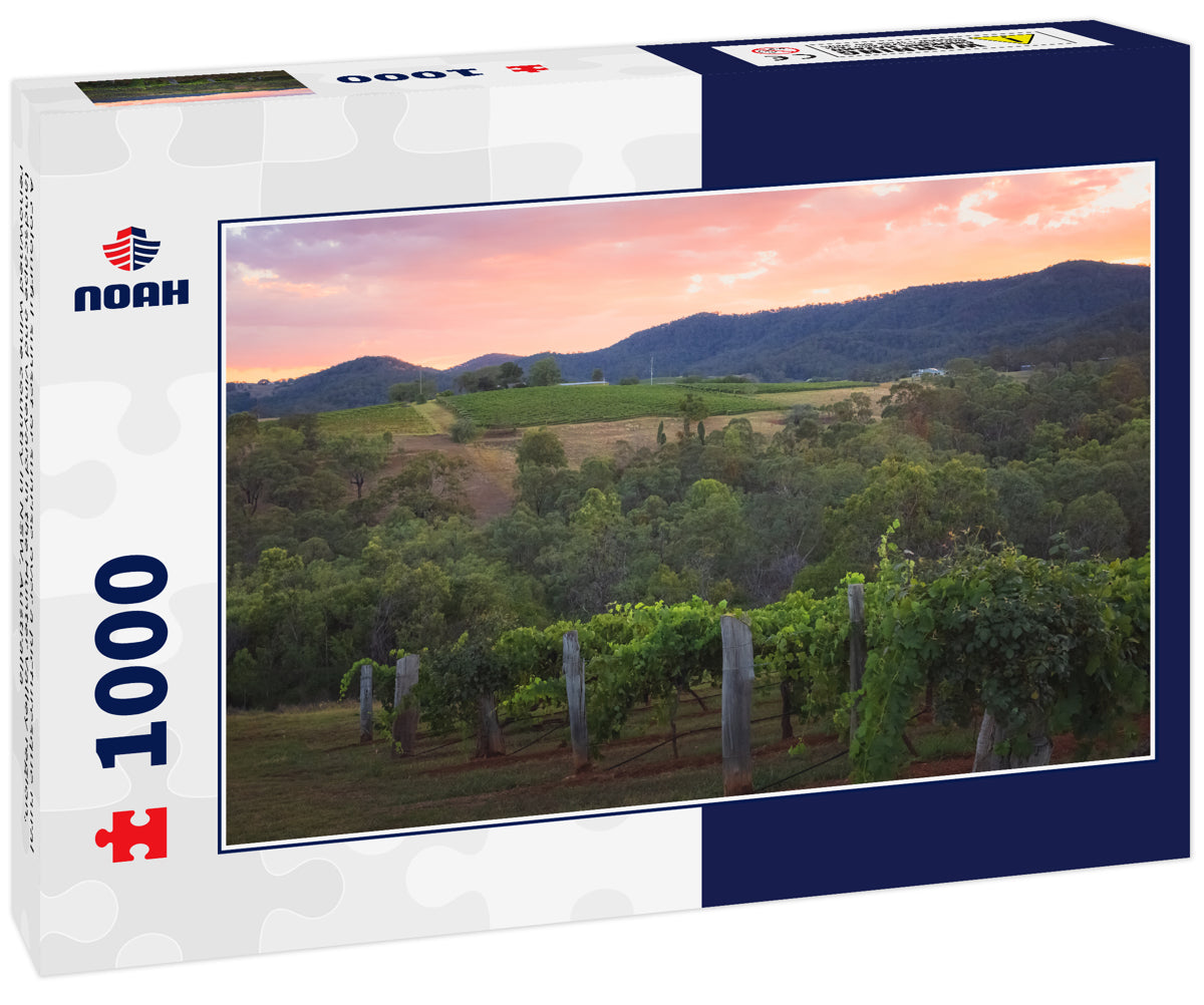 A colourful sunset or sunrise over a picturesque rural landscape and vineyard in the Hunter Valley region, renowned wine country in NSW, Australia