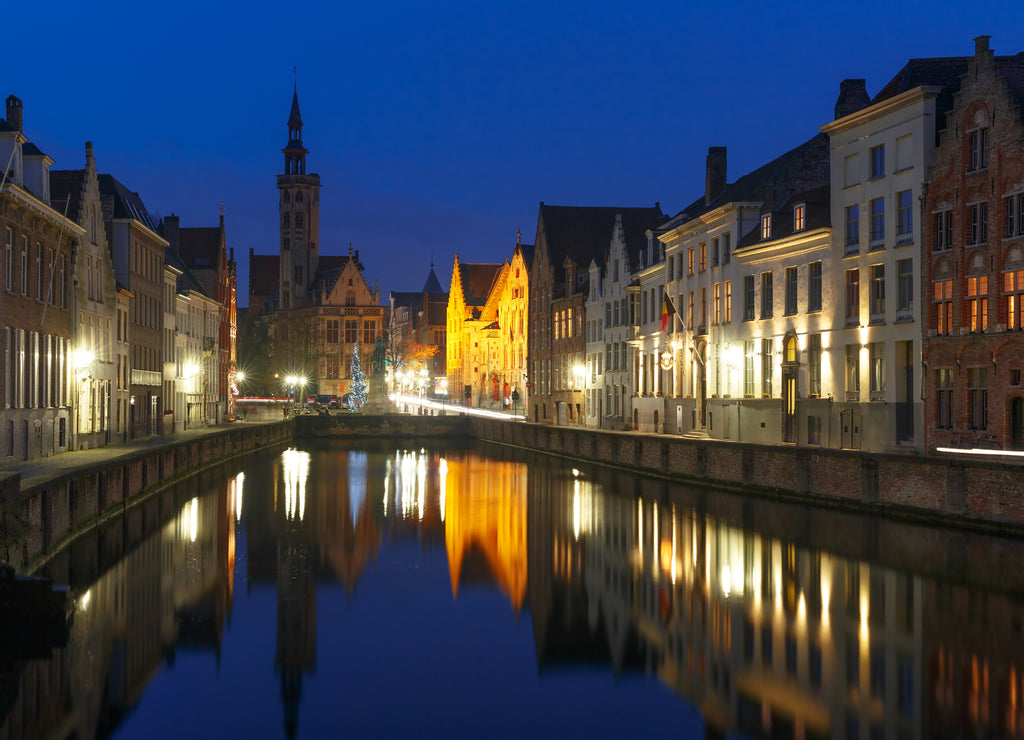 Scenic night cityscape with views of Spiegelrei and Jan van Eyckplein in Bruges, Belgium