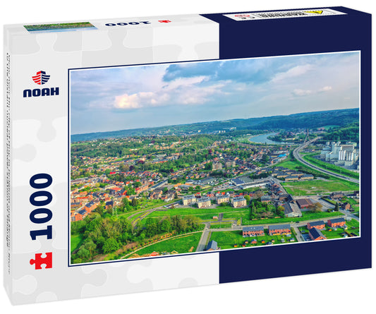 View over the city of Huy in Belgium and Meuse River to the distant nuclear power station of Tihange