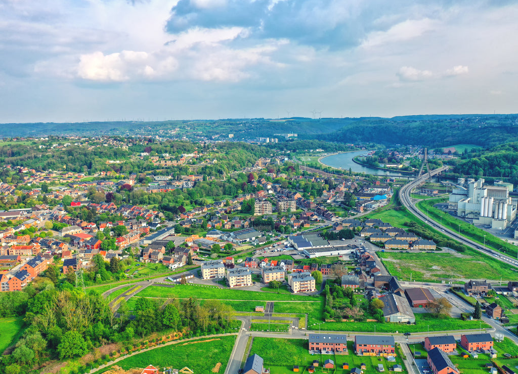View over the city of Huy in Belgium and Meuse River to the distant nuclear power station of Tihange