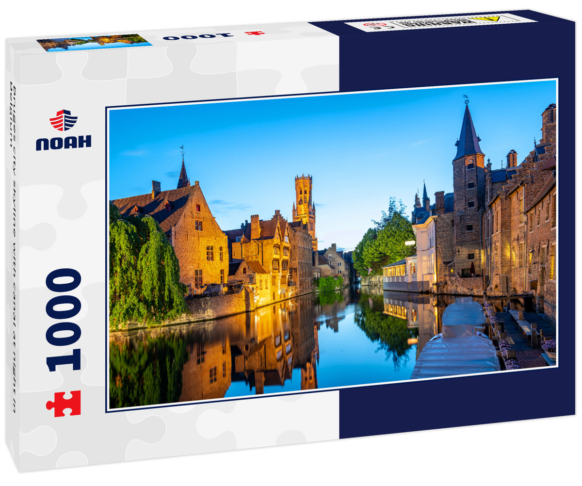 Bruges city skyline with canal at night in Belgium